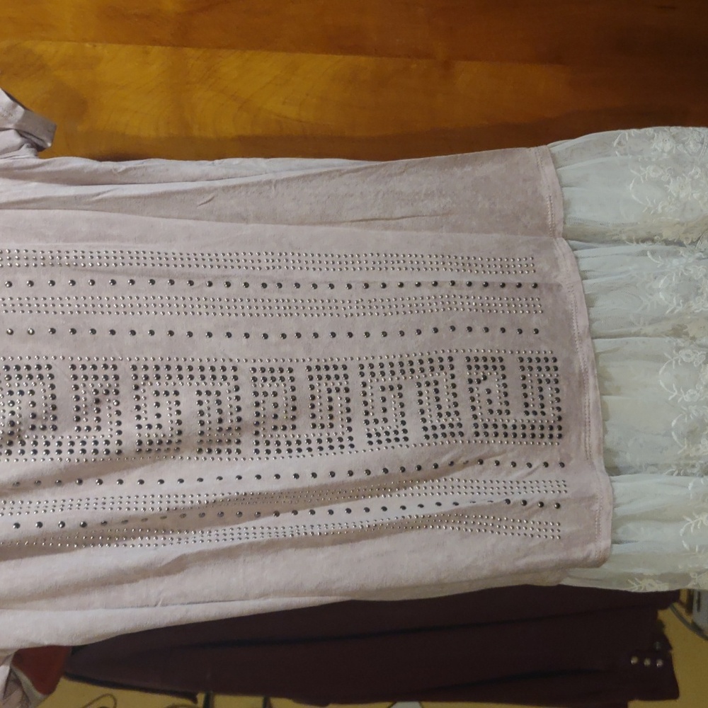 Cute Top with sequins and lace. Just sits in the closet
